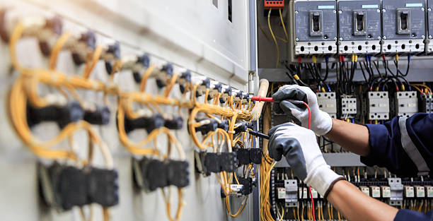 Professional Electrician technician working in Orchard Homes, MT